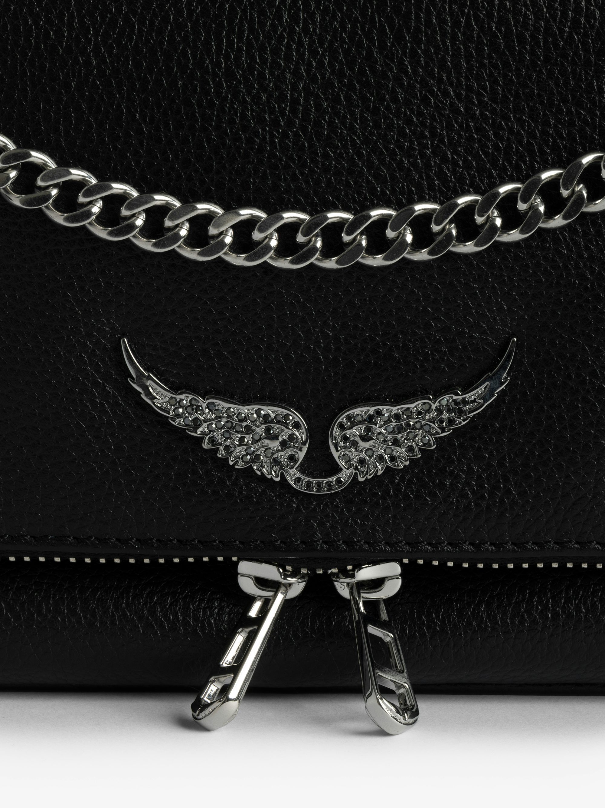 Rock II Clutch - Clutch in grained leather with sliding metal chain and signature wings.